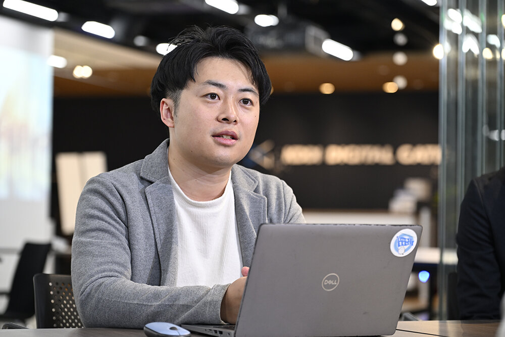「取り扱う商材の幅がますます広がる中、商材ごとに異なっている業務フローを構造化して整理することで、部署や役割を超えたシームレスな業務プロセス改善が迅速に実行できる未来を目指していきたい」と語る飯島